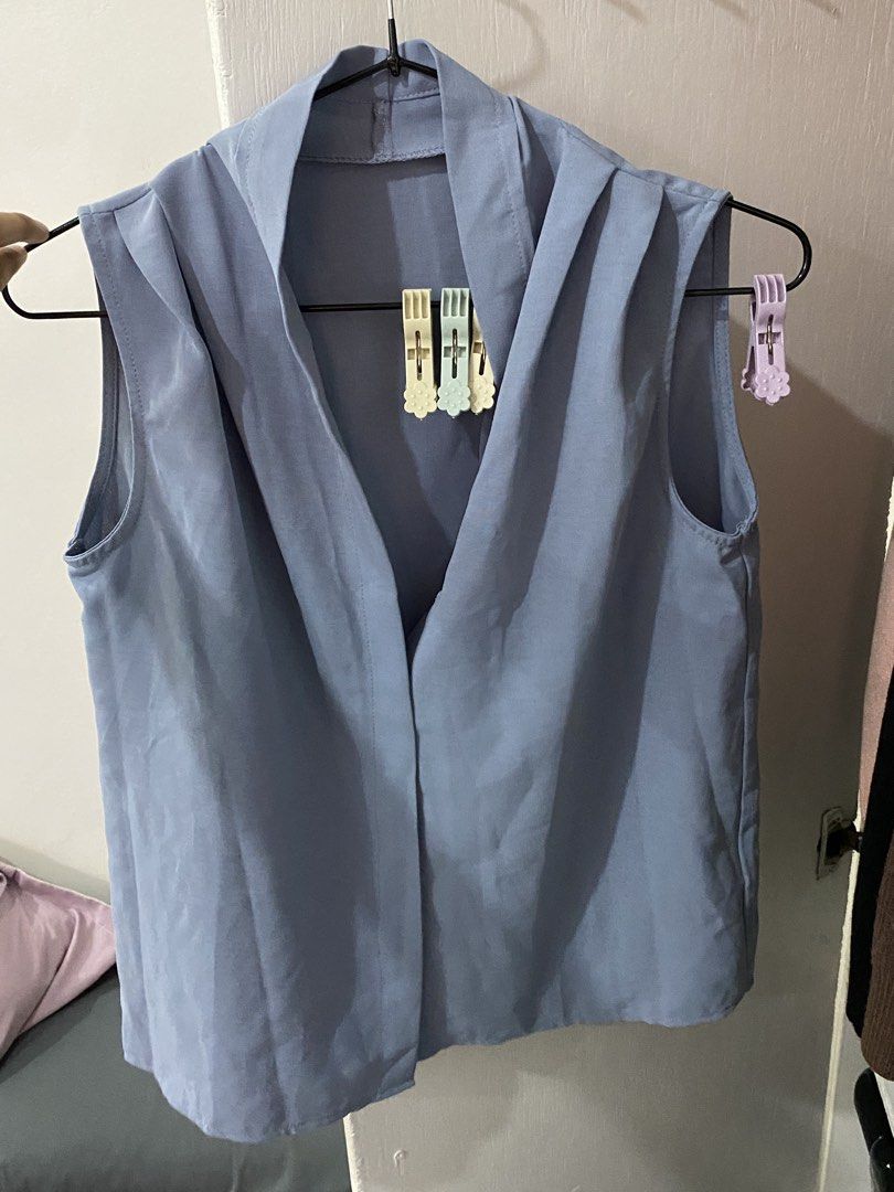 Sleeveless office pastel blue top (Category: Sleeveless) located in Quezon City. Submitted by jelly_fres (Listing ID 1433275341, Image 1). Description: Can fit up to medium.