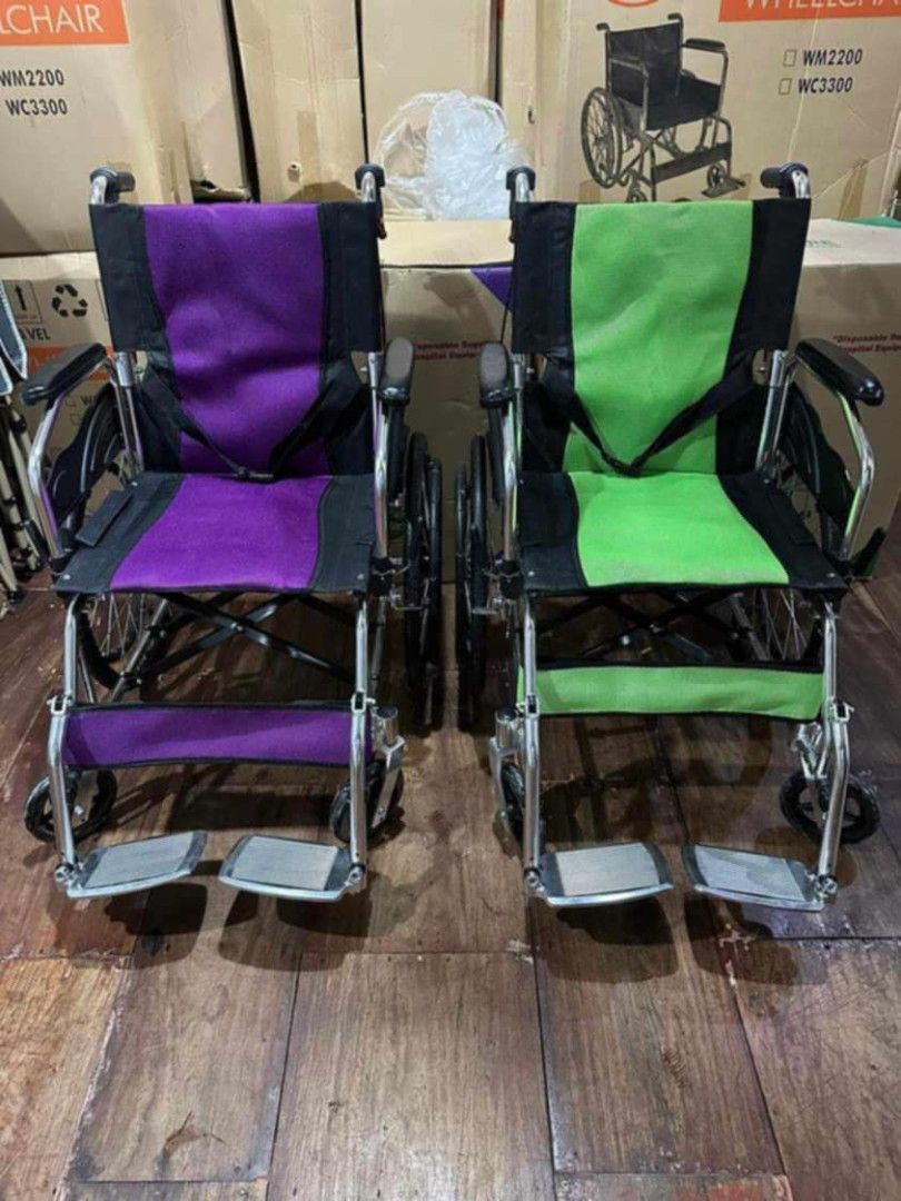 Solitaire Wheelchair (Category: Wheelchairs) located in Manila. Submitted by brightflower_273879 (Listing ID 1433279702, Image 2). Description: - Solitaire Foldable Wheelchair - Available Colors: Pink, Purple, Green, Blue - Includes Seatbelt for Safety - Comfortable Footrests - Lightweight and Easy to Maneuver - Designed for Mobility Assistance.