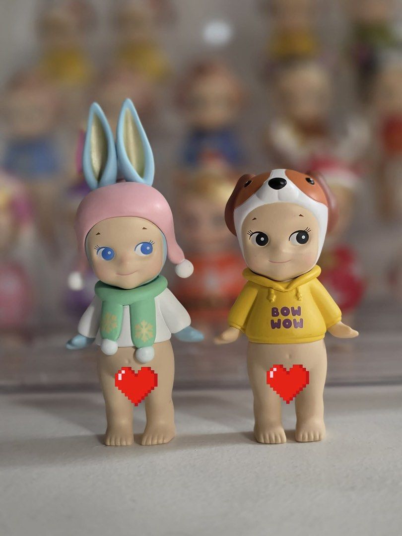 Sonny Angel Winter Series Rabbit & Dog (Category: Designer & Blind Box Toys) located in Manila. Submitted by jscsonny (Listing ID 1433336561, Image 1). Description: - Sonny Angel Winter Series figurines! - Features a rabbit with blue ears, pink hat, and green scarf. - Includes a dog wearing a yellow "BOW WOW" hoodie. - Collectible and perfect for display. - Great for gifting!.