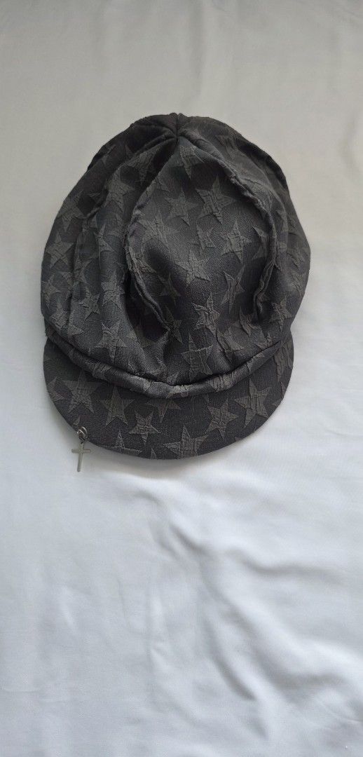 Star Pattern Cap (Category: Hats & Beanies) located in Singapore. Submitted by _nxght_ (Listing ID 1433274897, Image 1). Description: - Cap with star pattern - Features a brim - Dark interior - Safety pin attached.