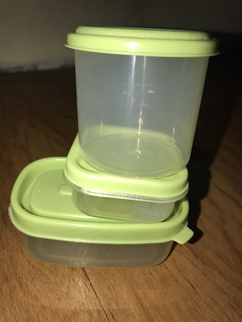 Storage Containers Set (Category: Storage Boxes & Baskets) located in Pasig City. Submitted by papotzy (Listing ID 1433264999, Image 3). Description: - Green storage container set - Includes one large container and three smaller containers with lids - Various shapes and sizes - Ideal for organizing small items - Made of plastic - Light green color.