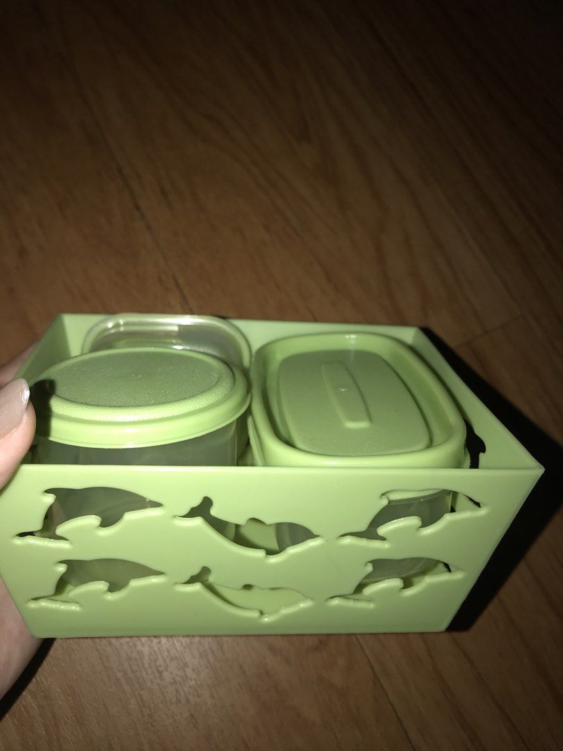 Storage Containers Set (Category: Storage Boxes & Baskets) located in Pasig City. Submitted by papotzy (Listing ID 1433264999, Image 2). Description: - Green storage container set - Includes one large container and three smaller containers with lids - Various shapes and sizes - Ideal for organizing small items - Made of plastic - Light green color.