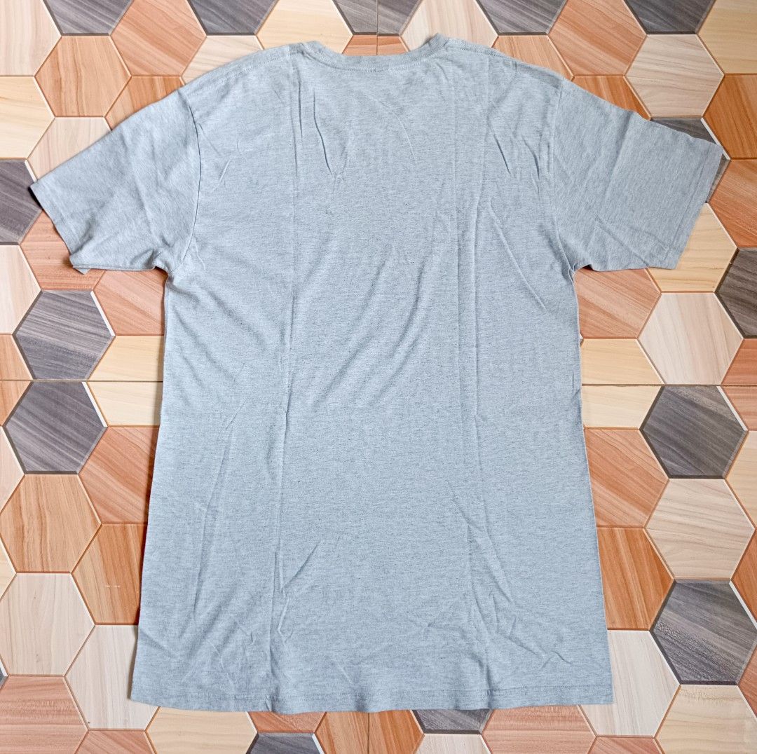 Stussy Gray T-shirt (Category: Tshirts & Polo Shirts ) located in Manila. Submitted by caps08 (Listing ID 1433293786, Image 3). Description: - Stussy T-shirt - Color: Gray with blue logo - Size: Large - Material: 90% Cotton, 10% Polyester - Care Instructions: Machine wash cold, tumble dry low, do not bleach, do not iron, do not dry clean.