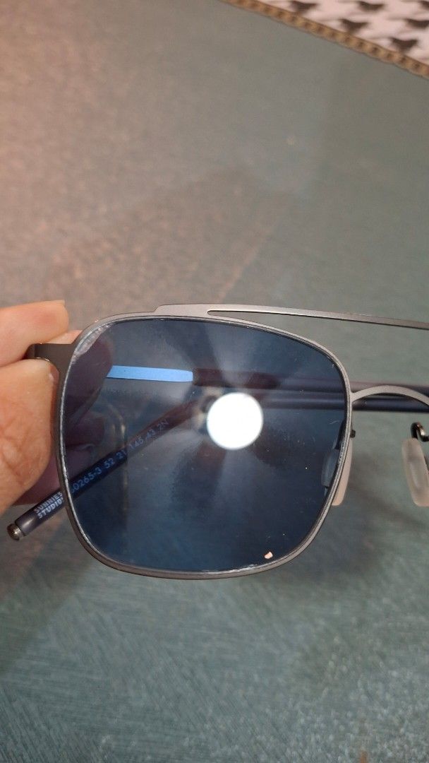 Sunglasses with Blue Tinted Lenses (Category: Sunglasses & Eyewear) located in Las Pinas. Submitted by mgr29 (Listing ID 1433336371, Image 2). Description: - Blue tinted lenses - Dark metal frame - Rectangular lens shape - Classic design - Suitable for everyday wear - Thin and sleek arms - White nose pads - Please see flaws.