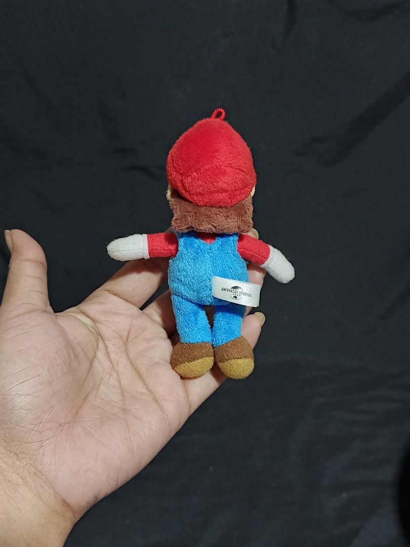 Super Nintendo World Super Mario Plush Keychain (Category: Character Goods) located in Compostela. Submitted by buenaflora04681 (Listing ID 1433211136, Image 2). Description: Keychain type.