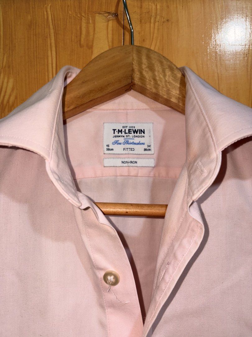 T.M. Lewin Pink Non-Iron Shirt (Category: Tshirts & Polo Shirts ) located in Manila. Submitted by ciiii1 (Listing ID 1433230926, Image 3). Description: - T.M. Lewin pink shirt - Fitted style - Made of cotton - Long sleeves - Button-down front - Size: 15/38cm, 34/86cm - Non-iron.