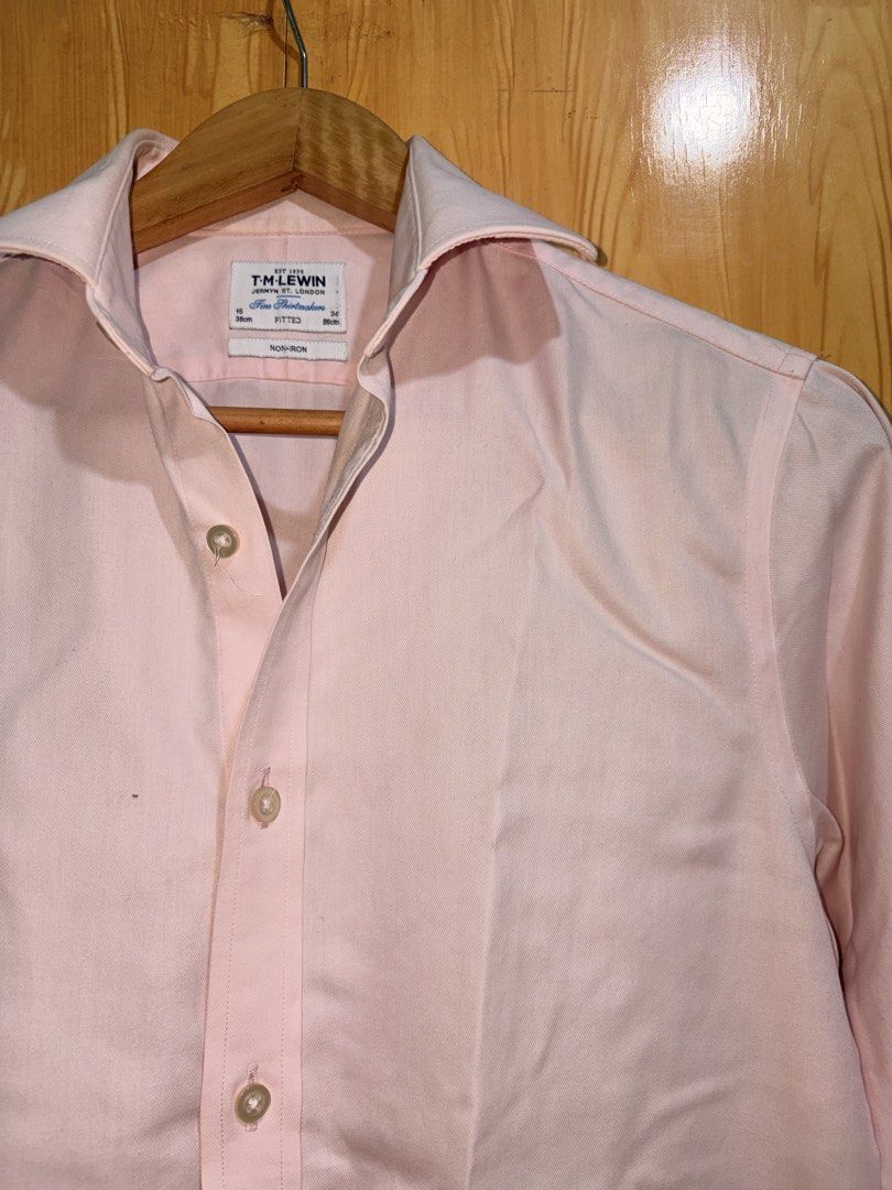 T.M. Lewin Pink Non-Iron Shirt (Category: Tshirts & Polo Shirts ) located in Manila. Submitted by ciiii1 (Listing ID 1433230926, Image 1). Description: - T.M. Lewin pink shirt - Fitted style - Made of cotton - Long sleeves - Button-down front - Size: 15/38cm, 34/86cm - Non-iron.