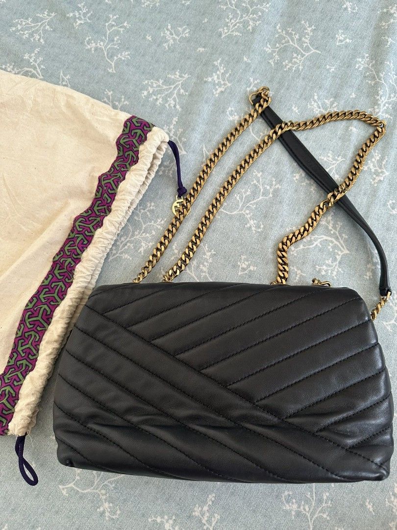 Tory Burch Small Kira Chevron Convertible Shoulder Bag (Category: Luxury Bags & Wallets) located in Cavite. Submitted by bdzblls (Listing ID 1433281679, Image 2). Description: - Tory Burch Kira Chevron Small Shoulder Bag - Made of genuine sheep hide - Interior: Zipper pocket, 2 insert pockets, and rear zipper pocket - Includes dust bag - Dimensions: 22cm (W) x 8cm (H) x 15cm (D) bought from zalora. reason for selling - hindi pasok sa aesthethic.
