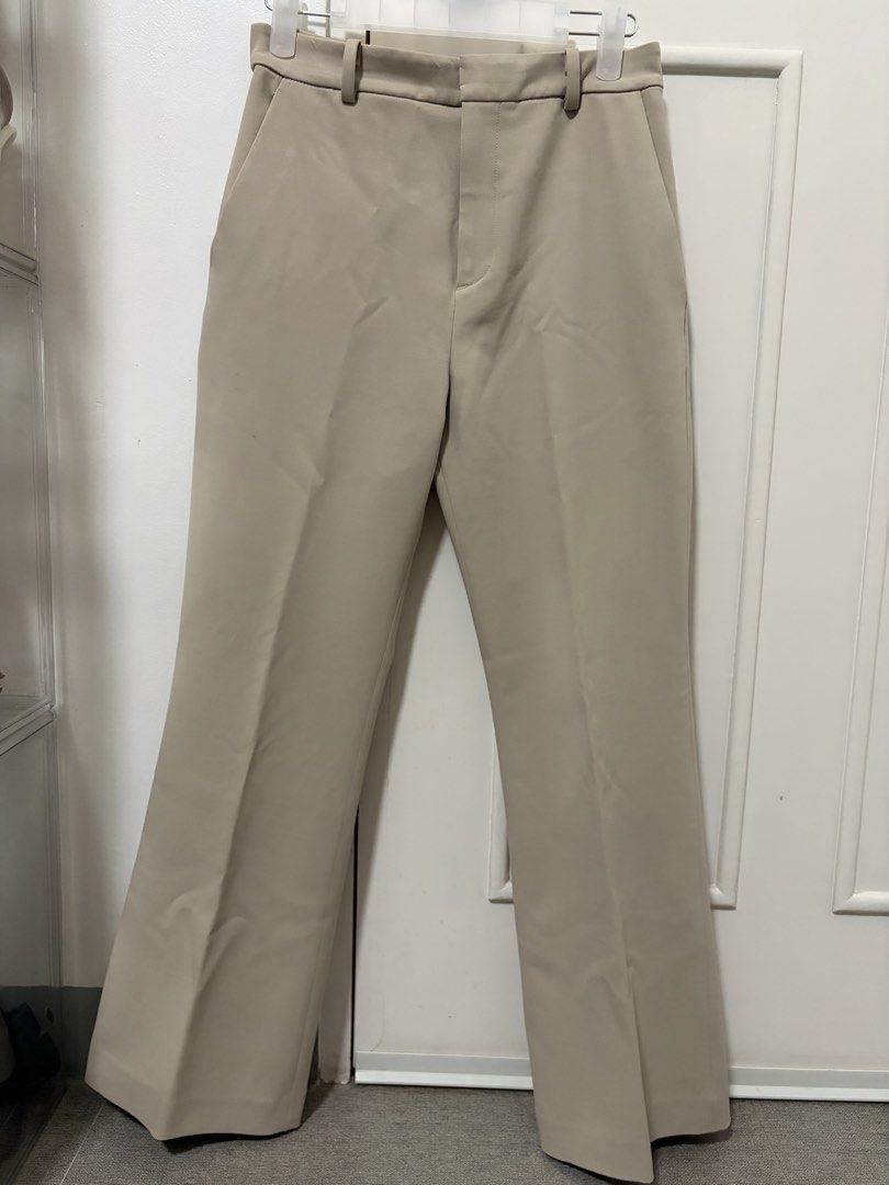 Uniqlo Beige Flare Pants - S (Category: Other Bottoms) located in Marikina City. Submitted by bea.dnns (Listing ID 1433325914, Image 1). Description: Waist 26" Length 35".