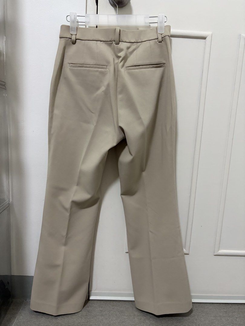 Uniqlo Beige Flare Pants - S (Category: Other Bottoms) located in Marikina City. Submitted by bea.dnns (Listing ID 1433325914, Image 3). Description: Waist 26" Length 35".