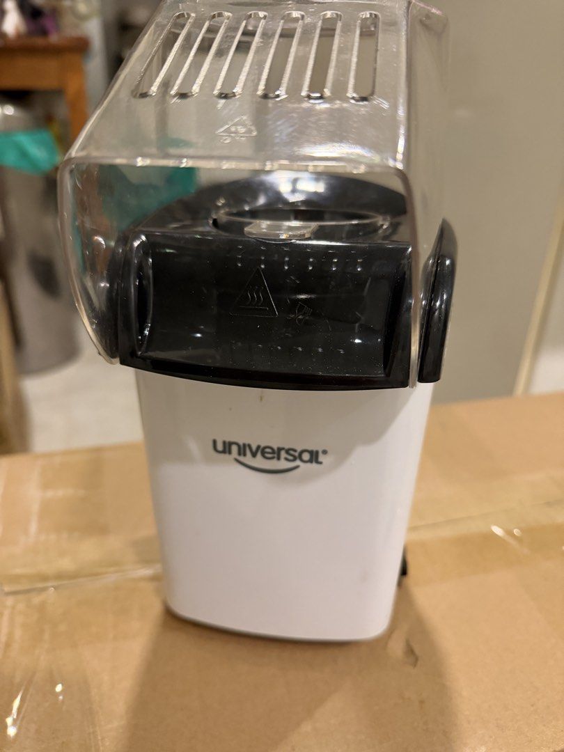 Universal Popcorn Maker (Category: Other Kitchen Appliances) located in Kuala Lumpur. Submitted by irishtea (Listing ID 1433307313, Image 2). Description: - Universal popcorn maker - Clear top design - Stylish black and white body - Comes with power plug - In good working condition - Ideal for home popcorn and snacks.