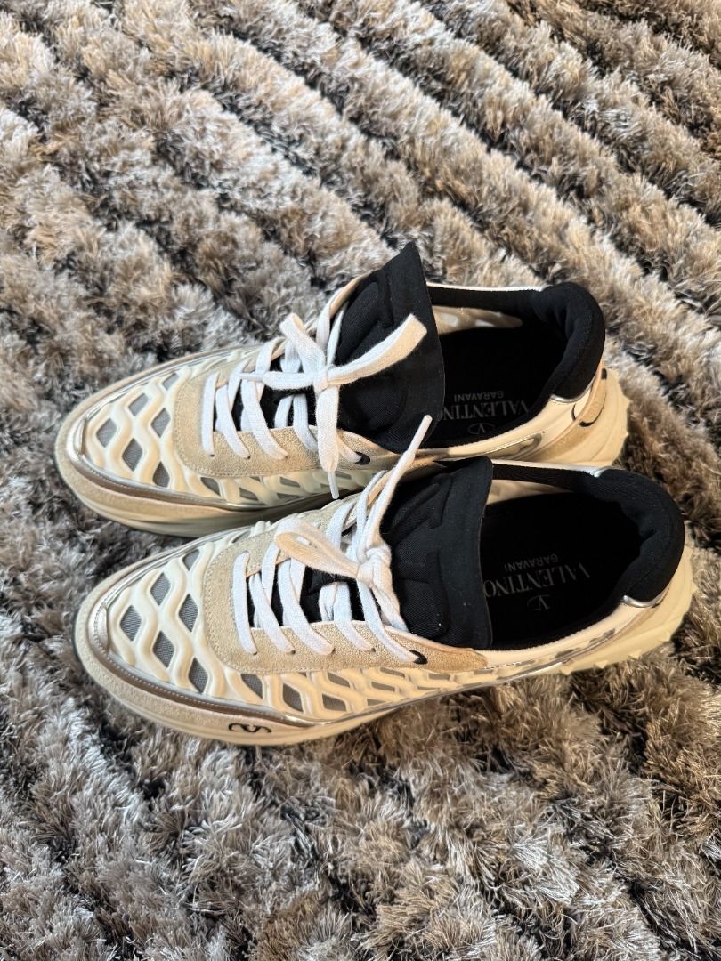 Valentino Gumboy Sneakers (Category: Sneakers & Footwear) located in Muntinlupa City. Submitted by clauisstuff (Listing ID 1433232433, Image 2). Description: 100% AUTHENTIC Valentino Garavani 'Gumboy' sneakers Rarely used Current Retail Price: PHP 53,000 - White, beige, and black - Diamond-patterned upper - Features Valentino logo on side and sole - A mix of calf leather, suede overlays, and breathable mesh inserts RFS: Decluttering MOP: BDO/BPI/