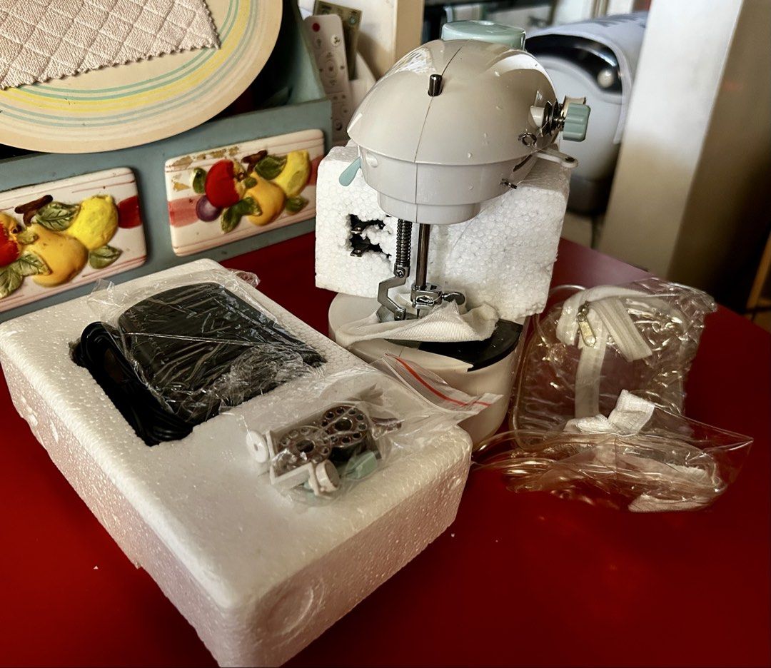 Vintage Sewing Genie Professional Style Sewing Machine. (Category: Looking For) located in Las Pinas. Submitted by rjmwings (Listing ID 1433266591, Image 3). Description: Vintage Sewing Genie Professional Style Sewing Machine. From 2003. Unused. It is a compact and lightweight portable sewing machine designed for ease of use. The machine features dual control with a simple on/off switch and includes a pedal for easy foot control. It comes pre-thr