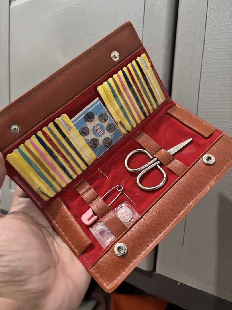 Vintage Sewing Kit with Scissors (Category: Craft Supplies & Tools) located in Baliuag. Submitted by importeditemsbykimi (Listing ID 1433341459, Image 1). Description: - Vintage Sewing Kits - Option 1: Brown leather-like case with snap closures. Includes needles, threads, buttons, and small scissors. - Option 2: Mickey Mouse design. Includes buttons, threads, and small scissors. - Both kits are compact and ideal for quick repairs or travel..