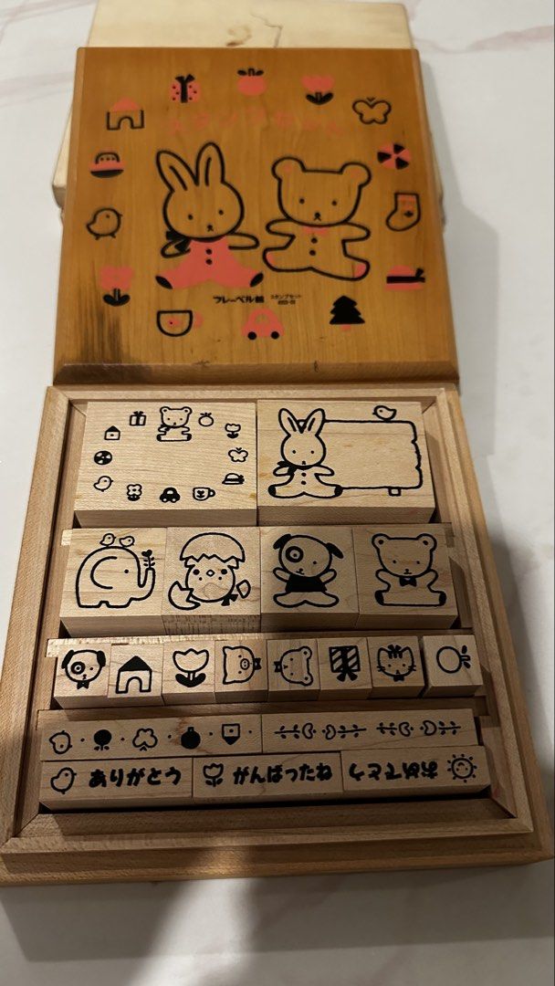Vintage Wooden Stamp Set (Category: Craft Supplies & Tools) located in Manila. Submitted by pinklilo (Listing ID 1433354022, Image 1). Description: - Adorable vintage wooden stamp set - Features cute animal and object designs - Includes a wooden storage box - Stamps appear unused - Ideal for scrapbooking and card making.