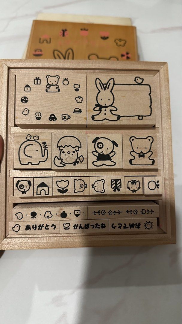 Vintage Wooden Stamp Set (Category: Craft Supplies & Tools) located in Manila. Submitted by pinklilo (Listing ID 1433354022, Image 2). Description: - Adorable vintage wooden stamp set - Features cute animal and object designs - Includes a wooden storage box - Stamps appear unused - Ideal for scrapbooking and card making.