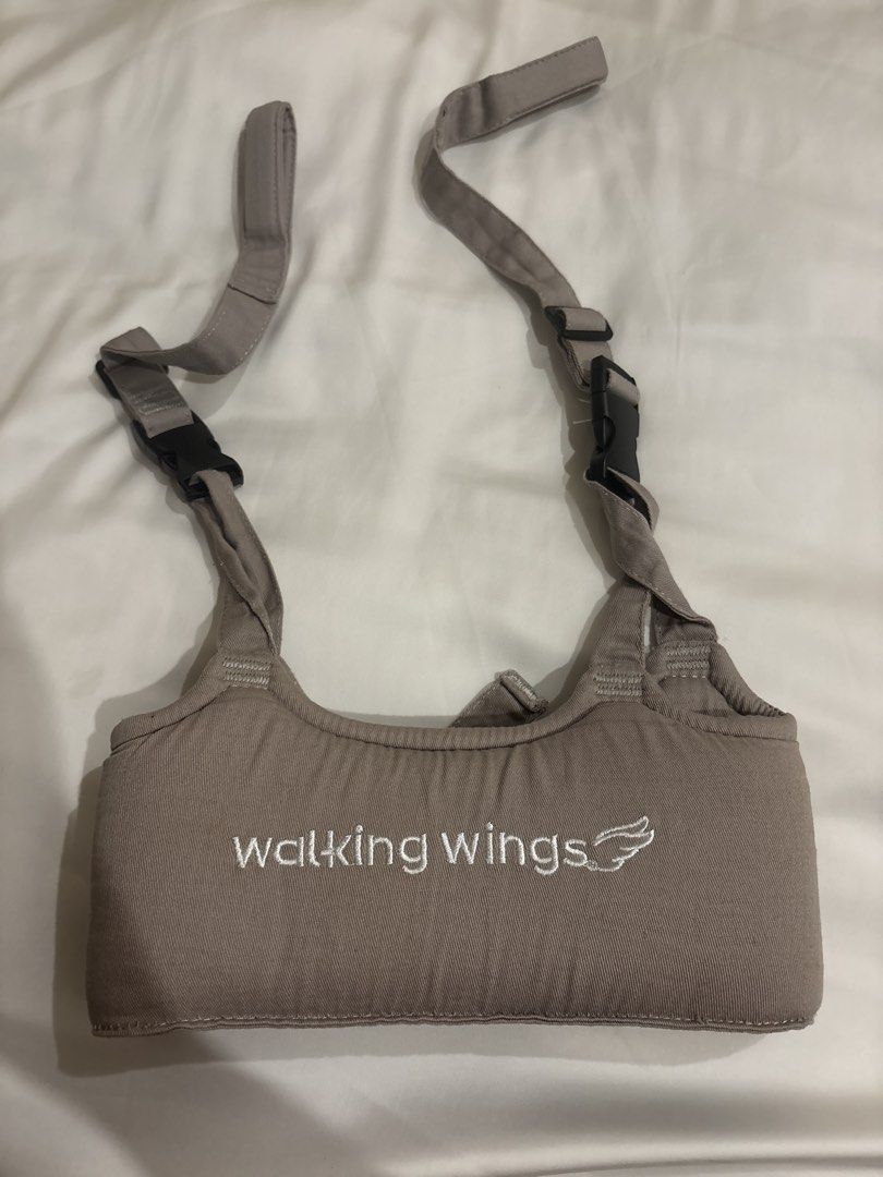 Walking Wings Baby Walking Assistant (Category: Carriers & Slings) located in Quezon City. Submitted by mikamdr (Listing ID 1433296506, Image 2). Description: - Walking Wings baby walking assistant for safe walking. - Supports baby's balance and reduces falls. - Two-stage harness design. - Original price tag from Rustan's (₱1,390). - used once, baby didn’t like wearing harnesses. - no box.