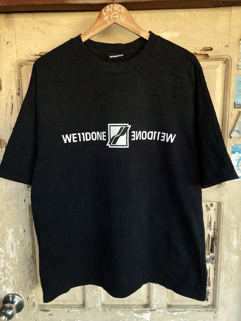 We11done Track T-shirt XL (Category: Tshirts & Polo Shirts ) located in Panabo. Submitted by lancegoods69 (Listing ID 1433313580, Image 1). Description: - Black We11done Track T-shirt - Size: XL - White logo on the front - Style Code: WD-TT1-22-652-U-IV - Material: 100% Cotton - Neckline: Crew neck - Sleeves: Short sleeves.