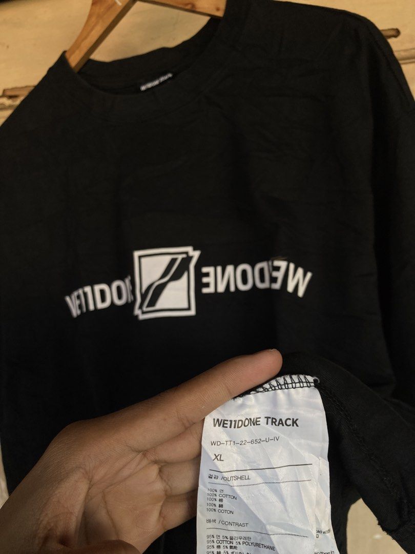 We11done Track T-shirt XL (Category: Tshirts & Polo Shirts ) located in Panabo. Submitted by lancegoods69 (Listing ID 1433313580, Image 3). Description: - Black We11done Track T-shirt - Size: XL - White logo on the front - Style Code: WD-TT1-22-652-U-IV - Material: 100% Cotton - Neckline: Crew neck - Sleeves: Short sleeves.