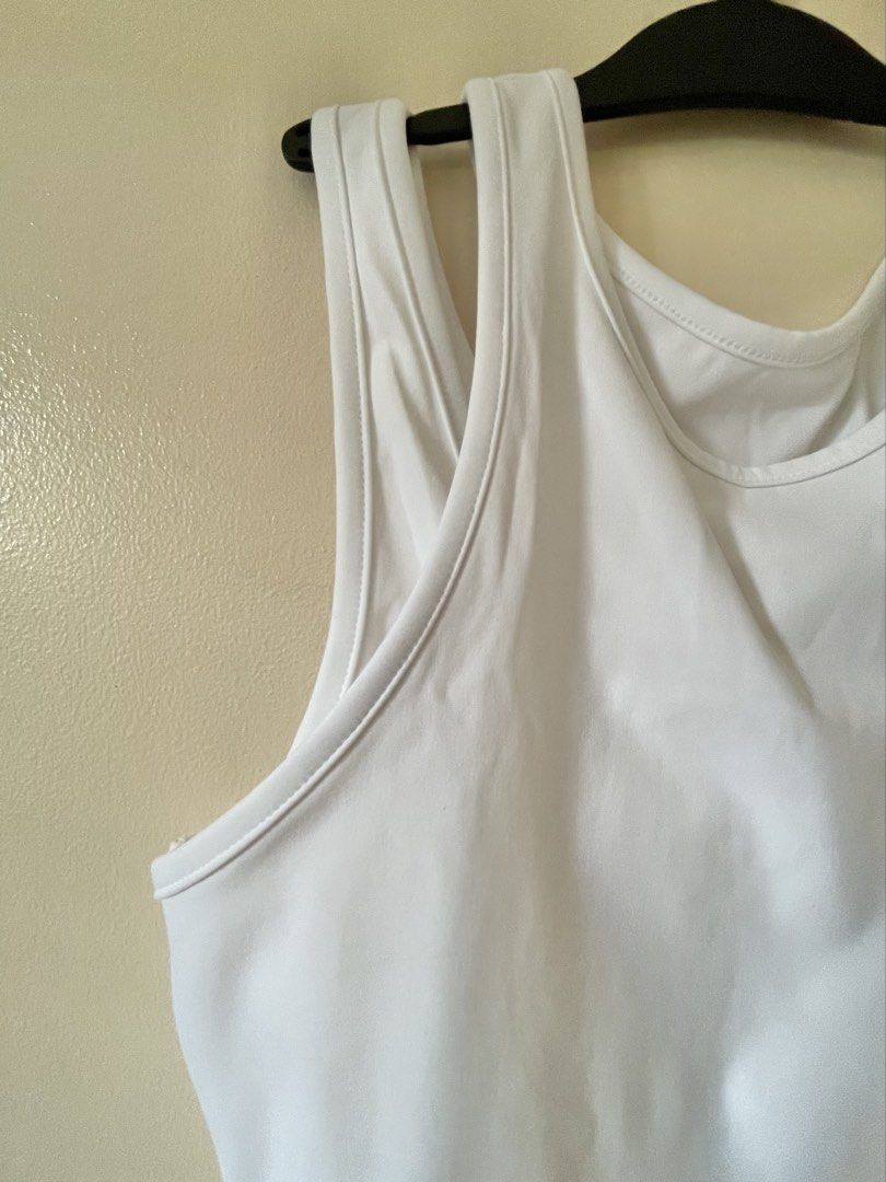 White Sleeveless Tank Top (active wear) (Category: Activewear) located in Cebu City. Submitted by choandcloud (Listing ID 1433294607, Image 2). Description: RFS: Does not fit me. This is a medium but fits better on Size S. Never been used..