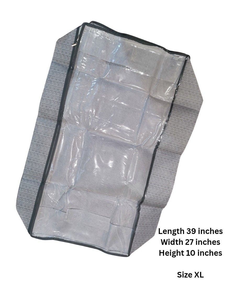 XL Under bed Organizer Storage Bag (Category: Storage Boxes & Baskets) located in Las Pinas. Submitted by Eunoia_ (Listing ID 1433240914, Image 1). Description: - XL storage bag - Clear top for easy viewing - Gray fabric body with black trim - Dimensions: 39" length x 27" width x 10" height - Designed for storage and protection.