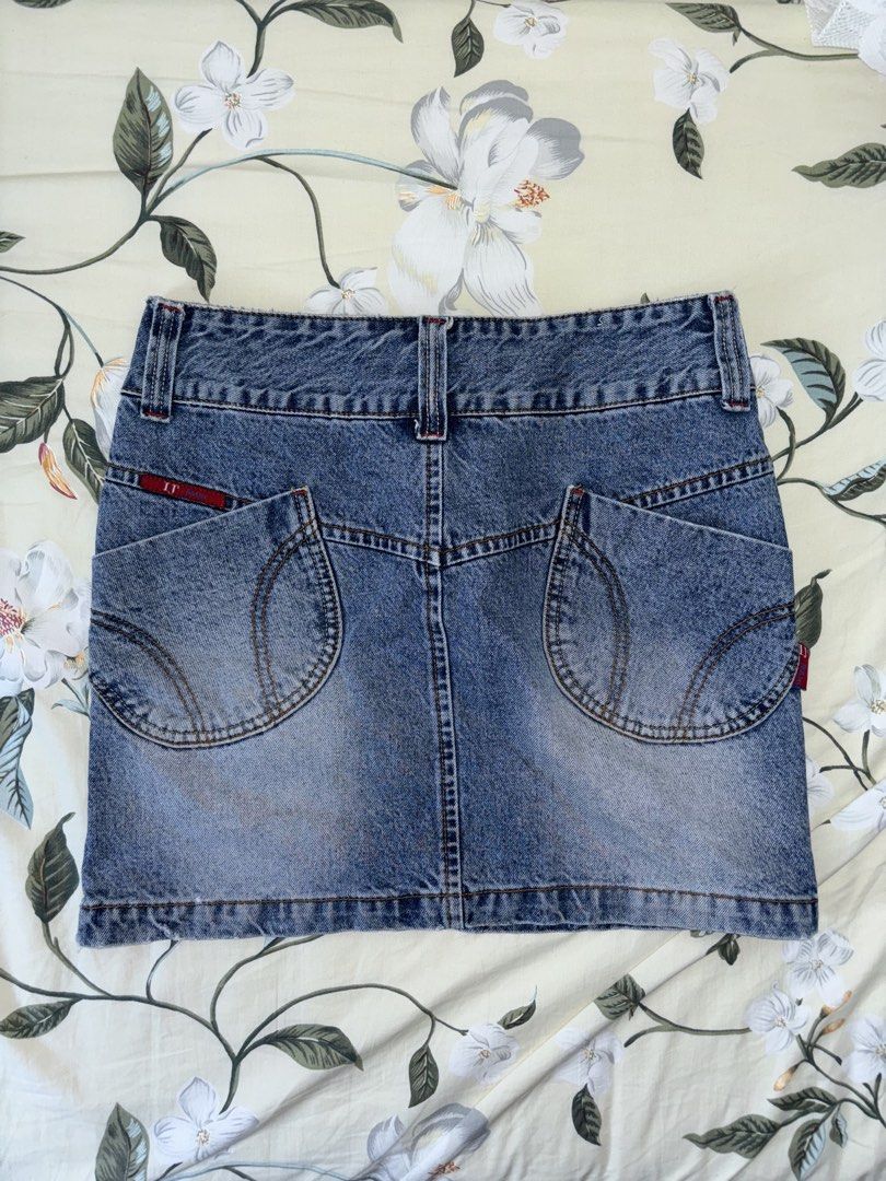Y2K Denim Skirt (Category: Skirts) located in Cavite. Submitted by bbbb444 (Listing ID 1433239378, Image 2). Description: !! NO WW PHOTOS !! - RFS: di nagagamit - Bought from another carouseller - No issues - Check slides for measurements.