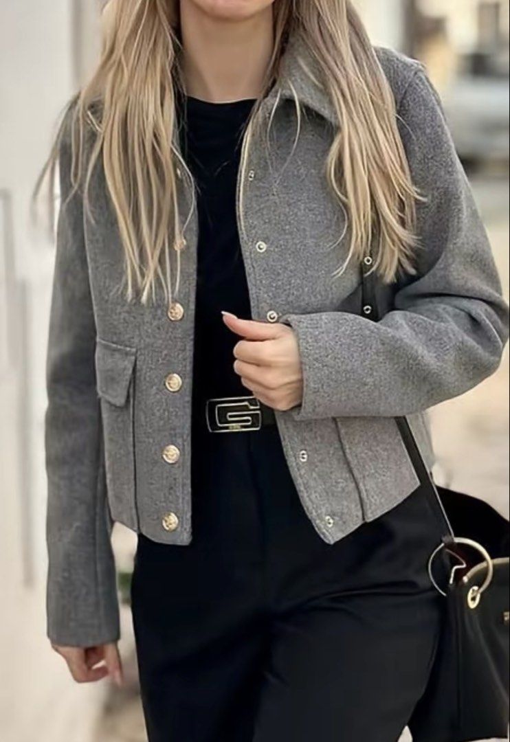 YATO Gray Jacket (small) (Category: Coats, Jackets and Outerwear) located in Manila. Submitted by acbefgh (Listing ID 1433303816, Image 2). Description: Stylish cropped jacket from YATO. Features a classic collar, button-down closure, and two front pockets. The jacket is a versatile piece, perfect for layering. It has a tailored fit and is made of a soft, textured fabric. The jacket is a neutral grey color, making it easy to pair with various out