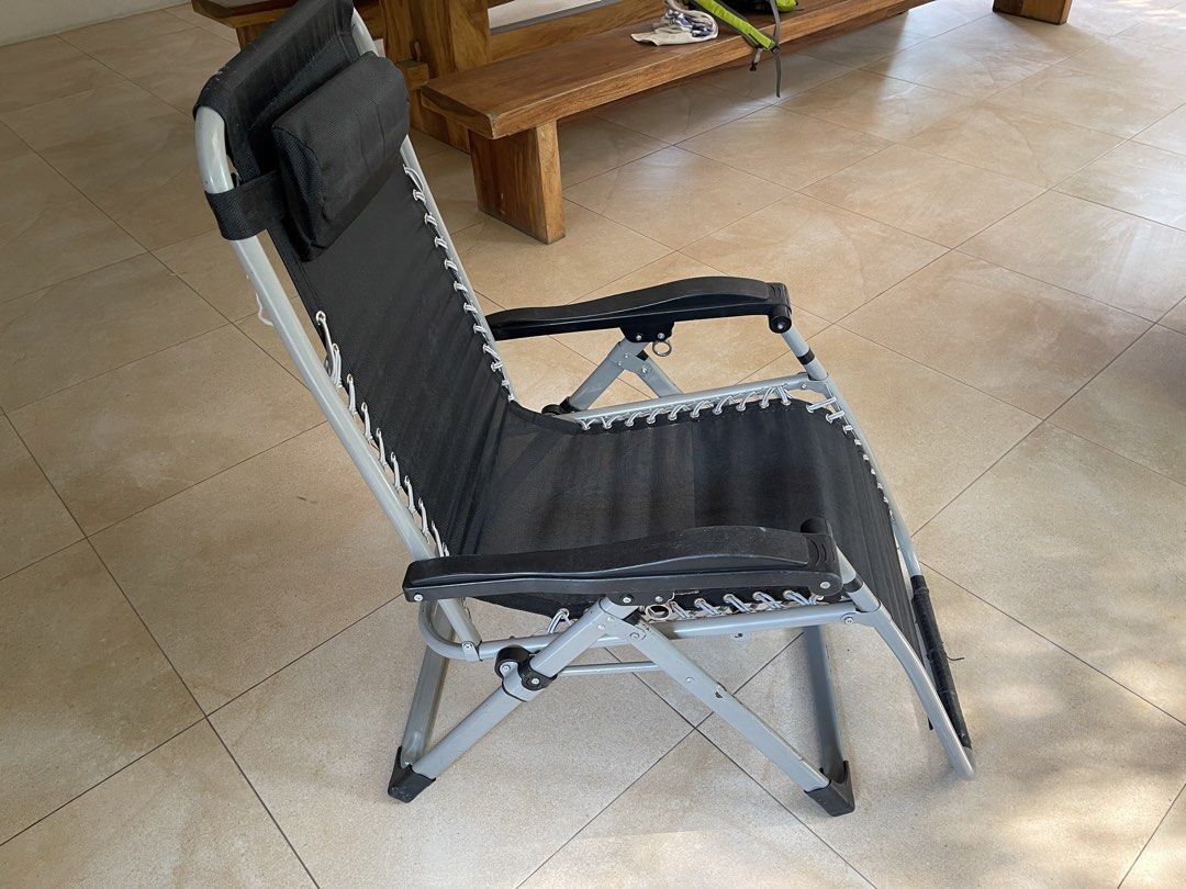 Zero Gravity Reclining Chair (Category: Chairs) located in Manila. Submitted by jacob.so (Listing ID 1433237012, Image 2). Description: - Reclining chair with headrest - Sturdy metal frame - Breathable mesh seat and back - Includes armrests - Foldable design for easy storage - Ideal for indoor and outdoor use.