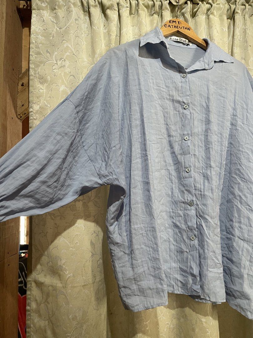 Acne Studios womens Shirt (Category: Tshirts & Polo Shirts ) located in Iligan City. Submitted by goldielooks143 (Listing ID 1433455588, Image 2). Description: - Acne Studios shirt in light blue. - Collared neckline and button-down closure. - Long sleeves with ribbed cuffs. - Cuffs feature the Acne Studios brand name. - Made in China. - actual measurent 28” width x 28” length.
