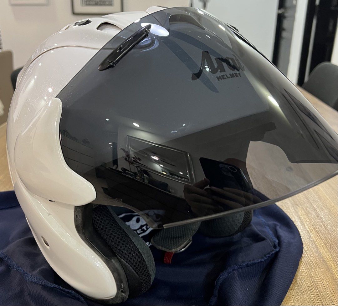 Arai Helmet (Ram4) Pearl White (Category: Motorcycle Accessories) located in Singapore. Submitted by nenekoisaplollipop (Listing ID 1433401781, Image 3). Description: - Arai Ram4 - Pearl White - XL - Mint Condition - Smoke Visor - arai String Bag - minor scratch.