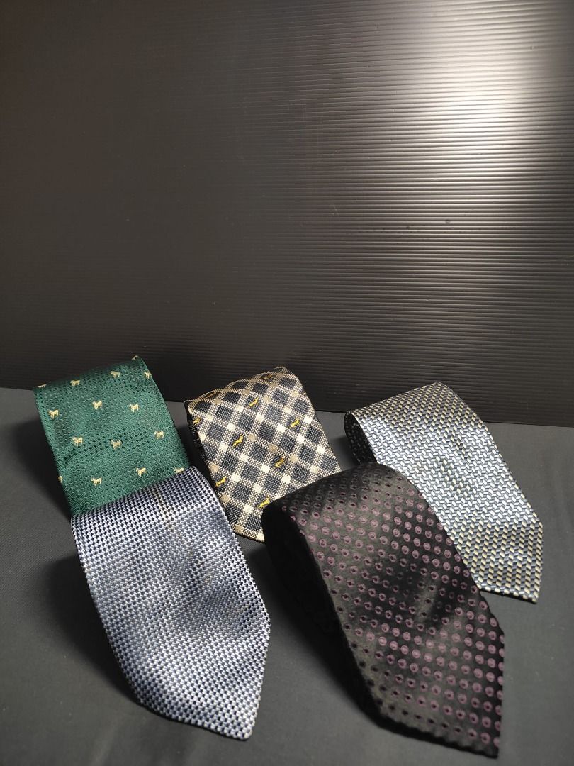 Assorted Patterned Ties - Bundle (Category: Ties) located in Singapore. Submitted by bl46444 (Listing ID 1433451611, Image 1). Description: - Bundle of 5 assorted ties - Variety of colours and patterns (polka dots, checks, animal motifs) - Suitable for various occasions - Adds flair to your wardrobe!.