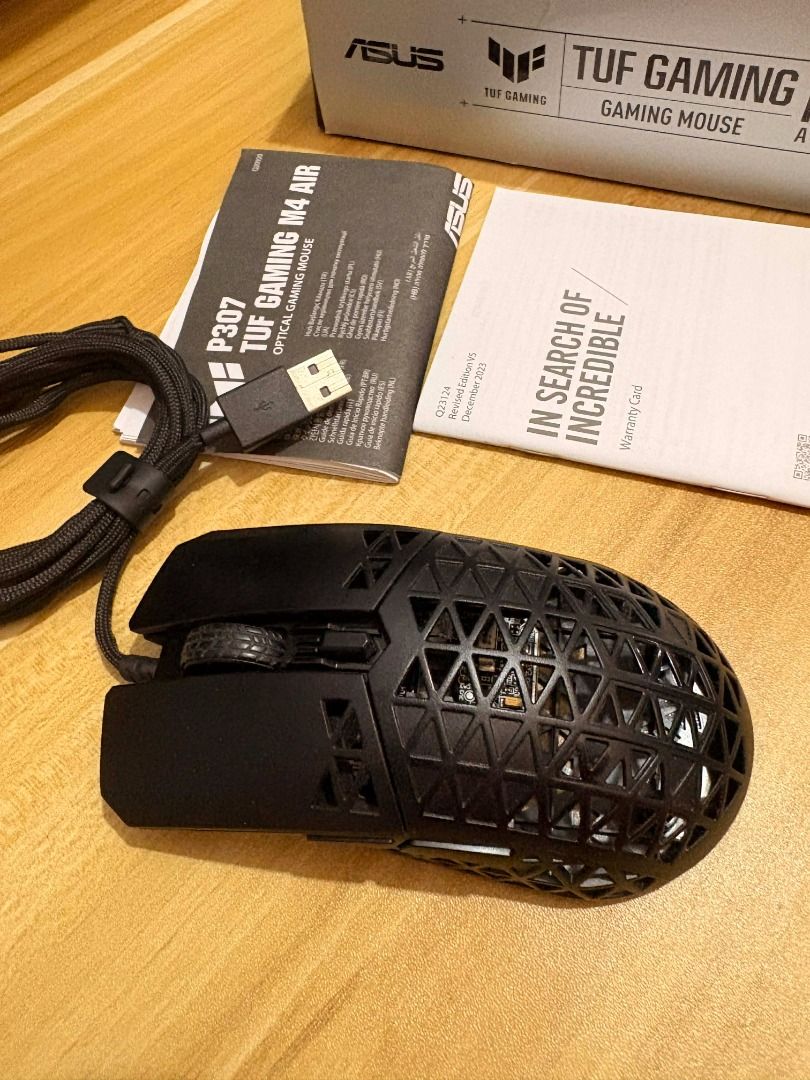 ASUS TUF Gaming M4 Air (Category: Mouse & Mousepads) located in Manila. Submitted by clevershark_d5e72d (Listing ID 1433403666, Image 2). Description: A lightweight wired gaming mouse with 16,000 dpi sensor, six programmable buttons, ultralight Air Shell, IPX6 water resistance , ASUS Antibacterial Guard, TUF Gaming Paracord and pure PTFE feet Gaming-grade 16,000 dpi optical sensor for pixel-precise tracking, plus DPI button for four-level sensiti