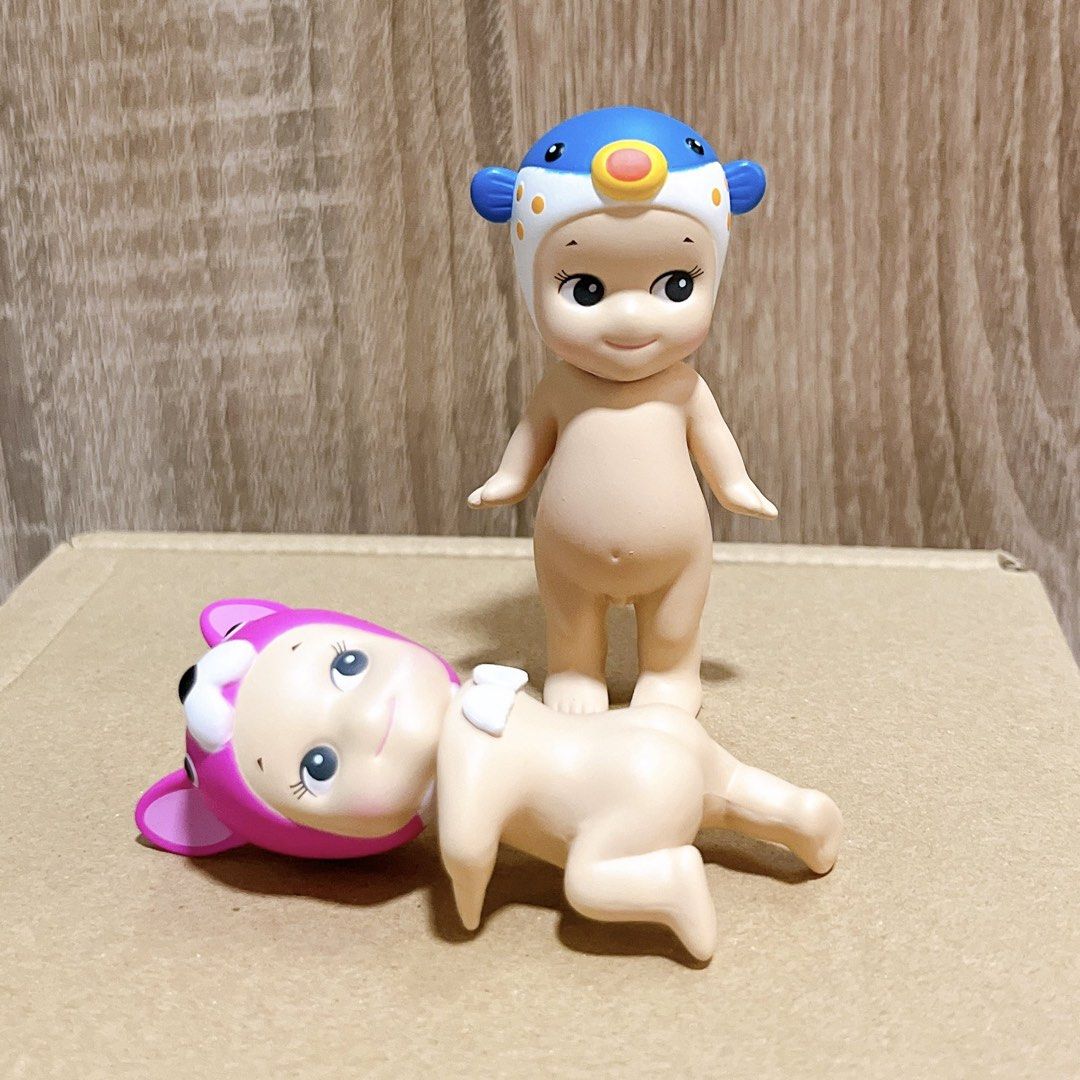 AUTHENTIC Sonny Angel (Blowfish) & Sonny Angel Hipper (Pink French Bull Dog) (Category: Designer & Blind Box Toys) located in Davao. Submitted by anikina (Listing ID 1433517934, Image 1). Description: ₱400 each / ₱700 if buying both Available: •Sonny Angel Marine Series (Blowfish) - 1 •Sonny Angel Hipper Looking Back Series (Pink French Bulldog) - 1 Unsealed but adhesive is unused. Literally just opened them and put them back in the box right awa