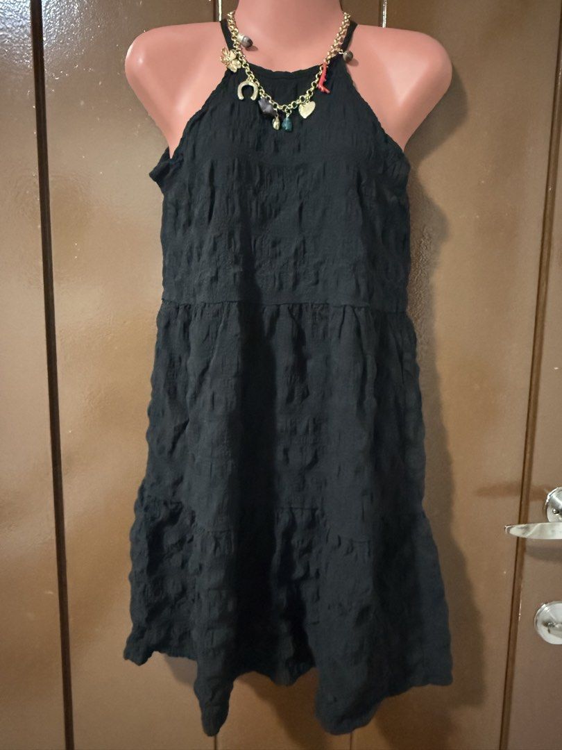 Black Crissa Halter Dress (Category: Dresses) located in Makati City. Submitted by naysan (Listing ID 1433530260, Image 1). Description: This is an almost new cocktail dress, used only twice. - Black halter dress - Relaxed fit - Knee-length This is very versatile and can be used from casual events to more formal parties. Note: Accessory not included..