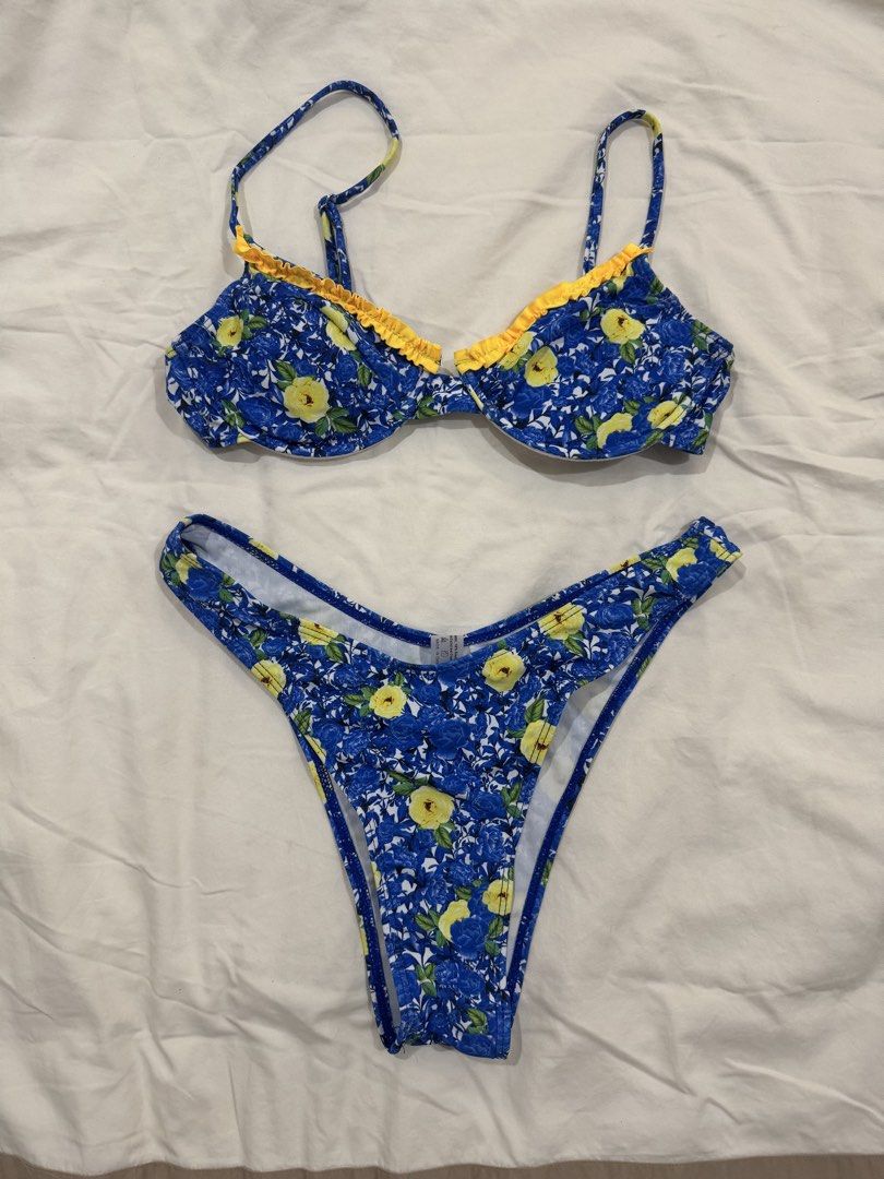 blue and yellow floral print bikini set (Category: Bikinis & Swimsuits) located in Muntinlupa City. Submitted by user3837 (Listing ID 1433408248, Image 2). Description: high quality blue and yellow floral bikini from shein, but honestly they have the best quality swimsuits clap is high quality too rfs: bottoms are a bit too big on me price slightly negotiable.