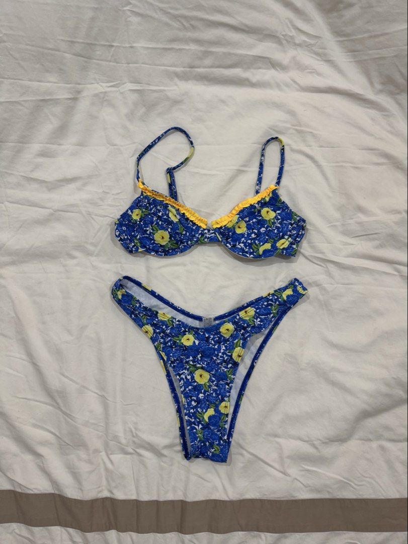blue and yellow floral print bikini set (Category: Bikinis & Swimsuits) located in Muntinlupa City. Submitted by user3837 (Listing ID 1433408248, Image 1). Description: high quality blue and yellow floral bikini from shein, but honestly they have the best quality swimsuits clap is high quality too rfs: bottoms are a bit too big on me price slightly negotiable.
