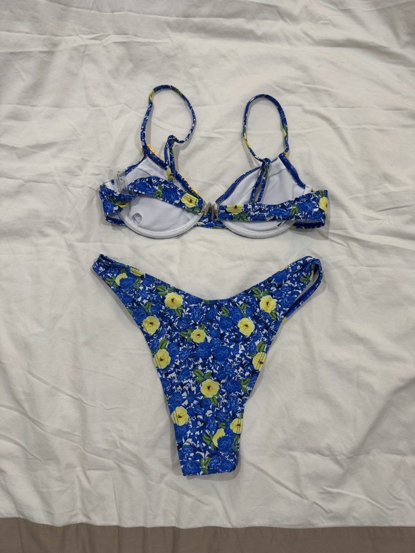 blue and yellow floral print bikini set (Category: Bikinis & Swimsuits) located in Muntinlupa City. Submitted by user3837 (Listing ID 1433408248, Image 3). Description: high quality blue and yellow floral bikini from shein, but honestly they have the best quality swimsuits clap is high quality too rfs: bottoms are a bit too big on me price slightly negotiable.