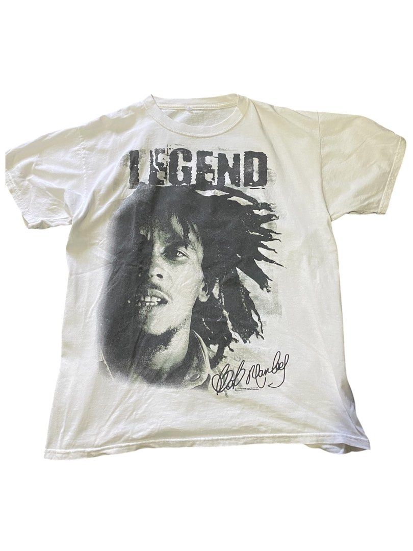 Bob Marley Legend T-shirt (Category: Tshirts & Polo Shirts ) located in Naga. Submitted by raahm (Listing ID 1433531466, Image 1). Description: - Bob Marley graphic t-shirt - Features a black and white image of Bob Marley - Includes the word "LEGEND" - Printed signature detail - Classic crew neck style - Made from comfortable cotton fabric.