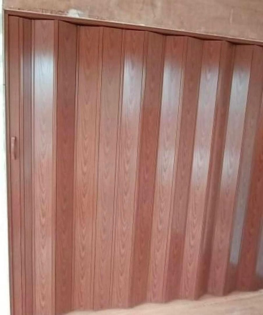 Brown Accordion Door-Mahogany (Choco) (Category: Other Home Furniture) located in Caloocan City. Submitted by zenerrr333 (Listing ID 1433444656, Image 2). Description: - Brown folding door - Vertical wood grain pattern - Features a handle - Made of durable material-PVC - Ideal for various interior spaces W=220cm, H= 209cm, 56sqft .