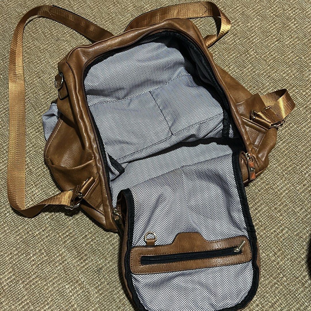 Brown Faux Leather Backpack (Category: Backpacks) located in Manila. Submitted by hhhopspp (Listing ID 1433553402, Image 3). Description: Faux Leather Backpack Excellent Condition Has multiple pockets inside and out Very sturdy and stylish.
