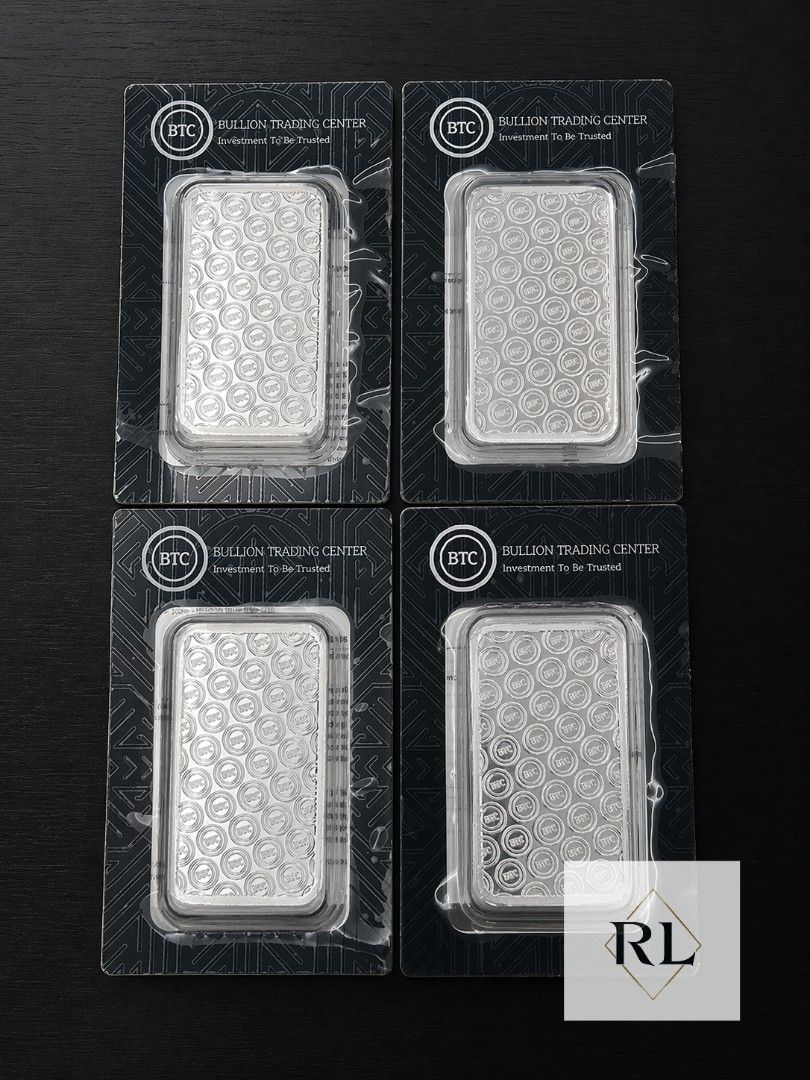 Bullion Trading Center Silver Bar (Category: Currency) located in Marilao. Submitted by ar_zam8 (Listing ID 1433579920, Image 1). Description: - Four silver bars - From Bullion Trading Center - Each bar sealed in original packaging - Features patterned design - Includes Bullion Trading Center logo and text.