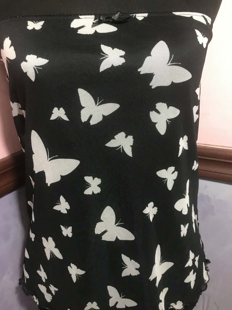 Butterfly Black Top (Category: Sleeveless) located in Cebu City. Submitted by alwayssecondoption (Listing ID 1433498764, Image 2). Description: Pre-owned item from my personal wardrobe (not thrifted/ukay). Well taken care of, in good condition. RFS: Decluttering.