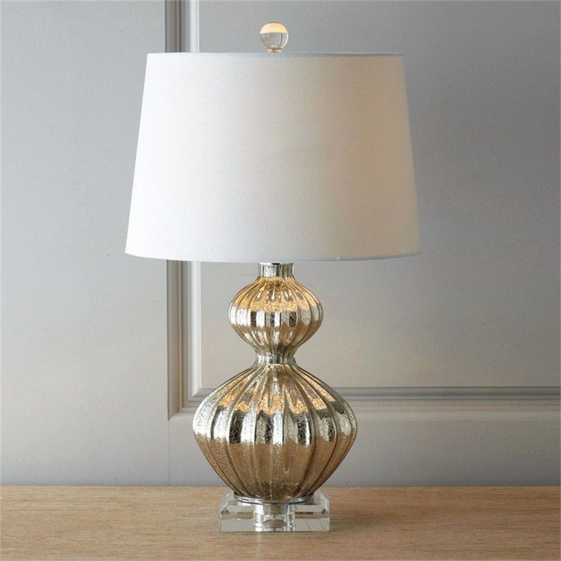 Camille Night Lamp Bedside Table Lamp Bedroom Livingroom (Category: Lighting) located in Taguig. Submitted by mommyph2023 (Listing ID 1433525437, Image 1). Description: - Classic shape with a glamorous twist - Light up your space with sparkle - Timeless elegance - Textured beauty - Mercury glass base with Fabric Shade - Soft curves, brilliant shine - The perfect touch of luxury -H62cm *W33cm.