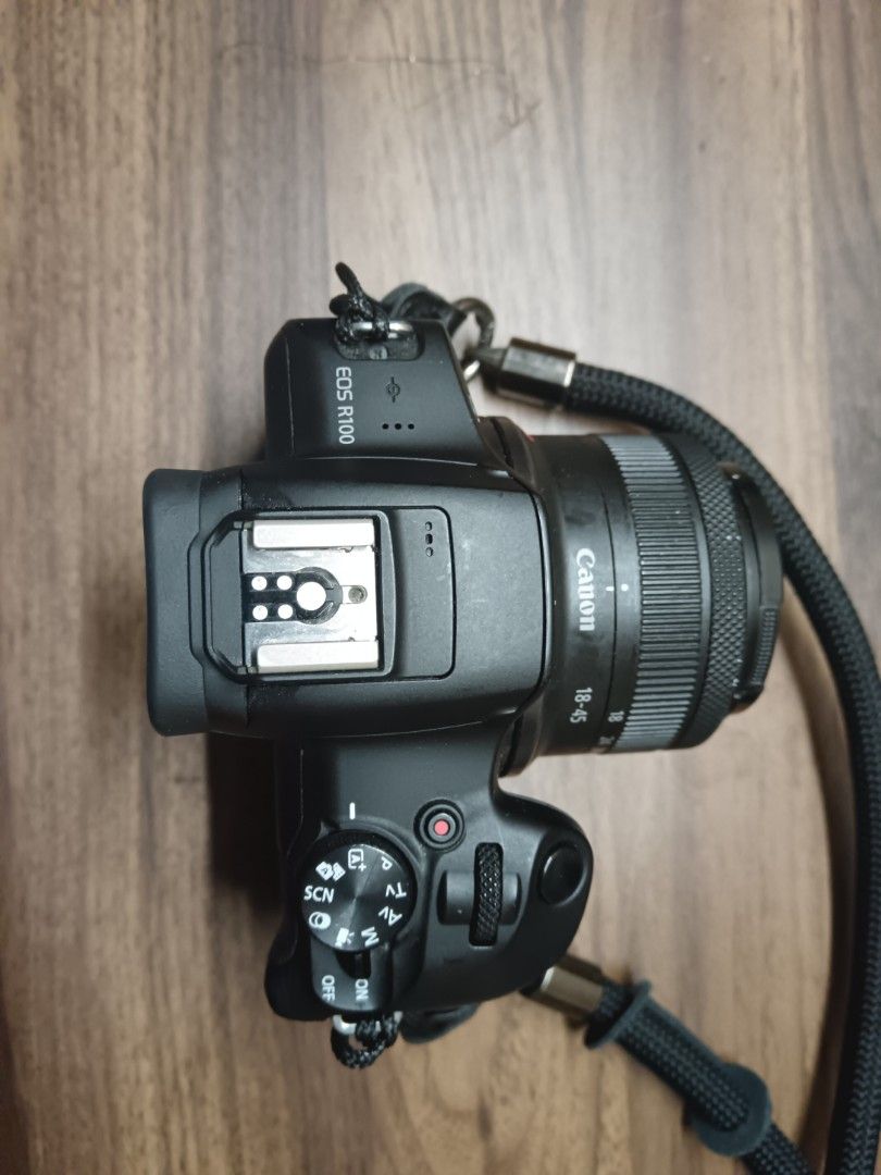 Canon EOS R100 + Kitlens, Cage & Battery (Category: Cameras) located in Bacolod City. Submitted by eosfer (Listing ID 1433522026, Image 2). Description: price negotiable Includes: - Body - 18-45mm f4.5-6.3 kitlens - 3rd party charger with 2 batteries total - Cage - No orig box - No orig lens cap - No bag // No SD card// no other issues aside from both the body and lens having cosmetic scratches -lens front plastic also ripped off, cosmetic also m
