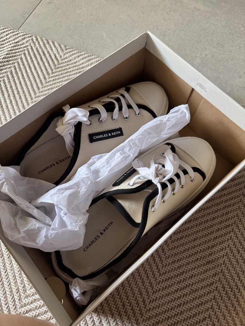 Charles and Keith Slip-on shoes (Category: Sneakers) located in Tubod. Submitted by carouselaiza (Listing ID 1433454801, Image 1). Description: .