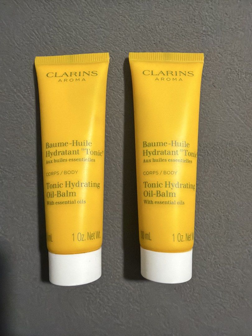 Clarins Aroma Tonic Hydrating Oil-Balm 30 ml (Category: Body Care) located in Singapore. Submitted by jayyzzz (Listing ID 1433490333, Image 1). Description: - Two Clarins Aroma Tonic Hydrating Oil-Balm tubes 30ml - one for $10, 2 for $18 - Contains essential oils - Moisturizes and revitalizes skin.
