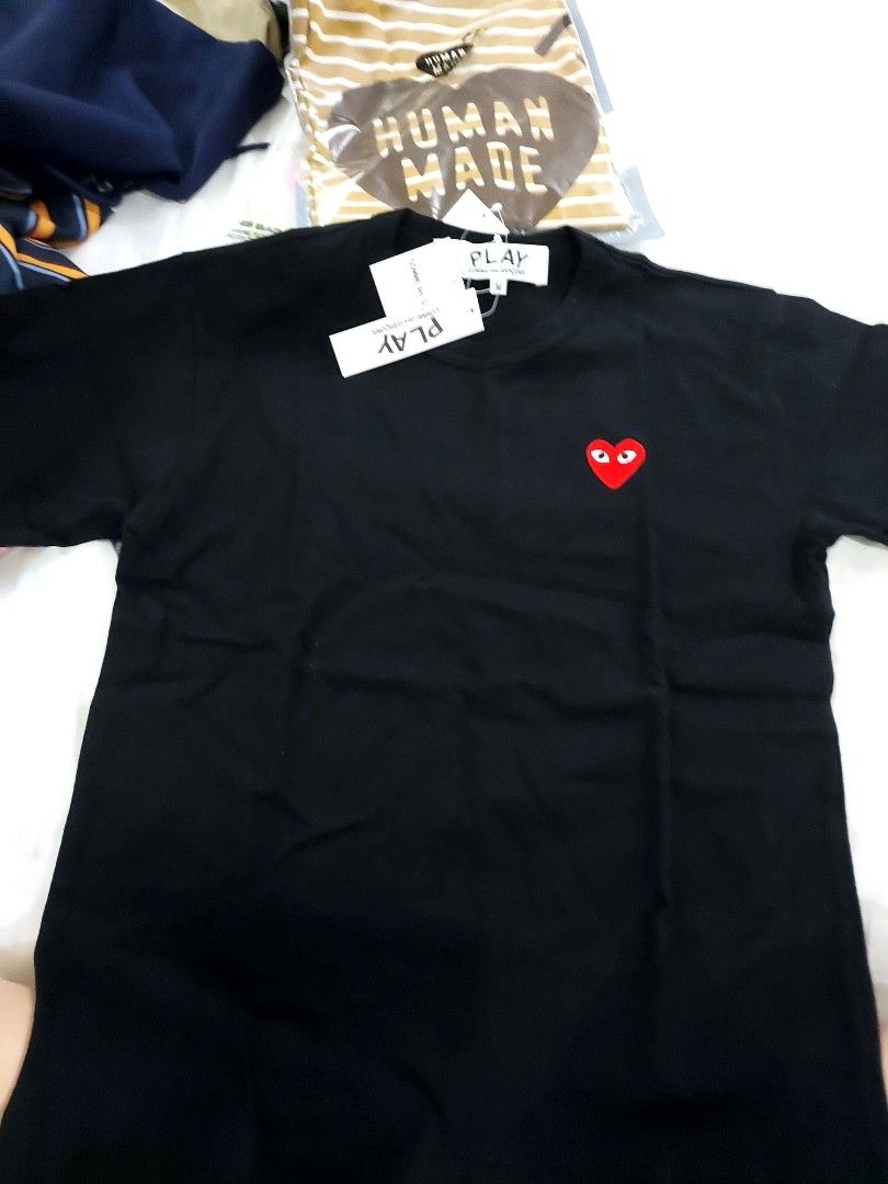 Comme des Garcons Play Black T-shirt (Category: Shirts) located in Paranaque City. Submitted by andim8 (Listing ID 1433489925, Image 3). Description: - Black Comme des Garcons Play T-shirt - Iconic red heart logo - Crew neck and short sleeves - Brand new with original tags - Comfortable fabric - Perfect for everyday wear - Classic and versatile design Brabd New with Tags.