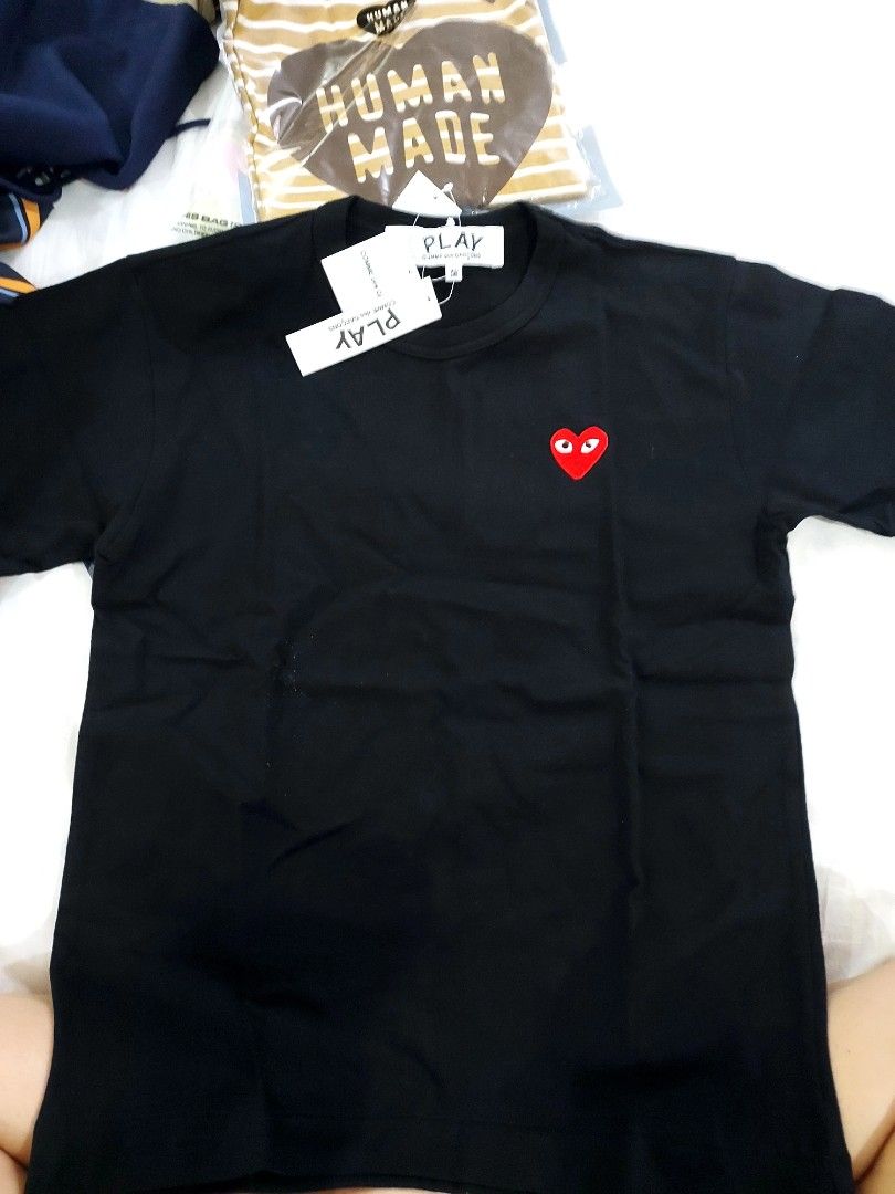Comme des Garcons Play Black T-shirt (Category: Shirts) located in Paranaque City. Submitted by andim8 (Listing ID 1433489925, Image 1). Description: - Black Comme des Garcons Play T-shirt - Iconic red heart logo - Crew neck and short sleeves - Brand new with original tags - Comfortable fabric - Perfect for everyday wear - Classic and versatile design Brabd New with Tags.