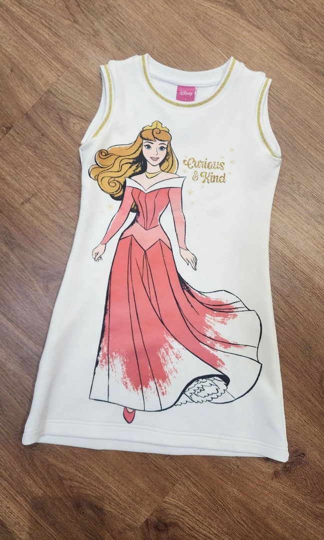 Disney Princess Aurora Sleeveless Top (Category: Babies & Kids Fashion) located in Quezon City. Submitted by flabbergasted31 (Listing ID 1433429735, Image 1). Description: - Disney Princess Aurora design - Sleeveless top - White base color - Gold trim neckline - Size 4 - Features Disney logo on tag.