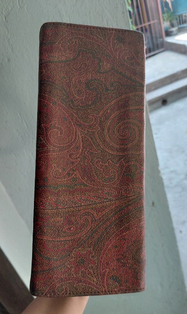 Etro Paisley Print Handbag with Shoulder Strap (Category: Luxury Bags & Wallets) located in Makati City. Submitted by fiestypam (Listing ID 1433525020, Image 3). Description: - Authentic Etro handbag - Signature paisley print - Top handle and detachable shoulder strap - Flap closure with gold-tone accent - Includes dust bag - Interior zip pocket -1 Handle shows some wear NO COD/COP.